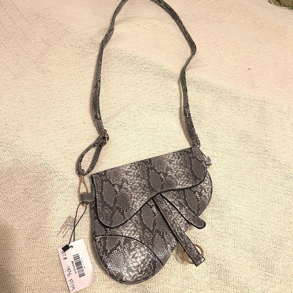 On The Wild Side crossbody purse. Brand New with tag. Grey/White snake print.